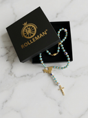 Ave Maria Nomads | Zigeunerwagen | Türkisfarbener Rosenkranz mit dunkelblauen Perlen – vergoldetes Rolleman-Logo mit Kreuz und Magnetverschluss