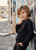 Sweater Tjabo - Kids, zwart met fluor-orange accenten